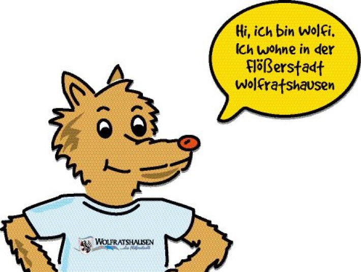 Wolfi, das Maskotchen, gibt Hinweise in einer Sprechblase, © Hahn littlefair